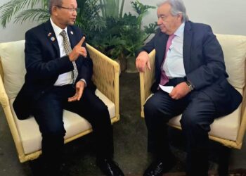 Leslie Voltaire rencontre António Guterres lors de la Conférence des Parties